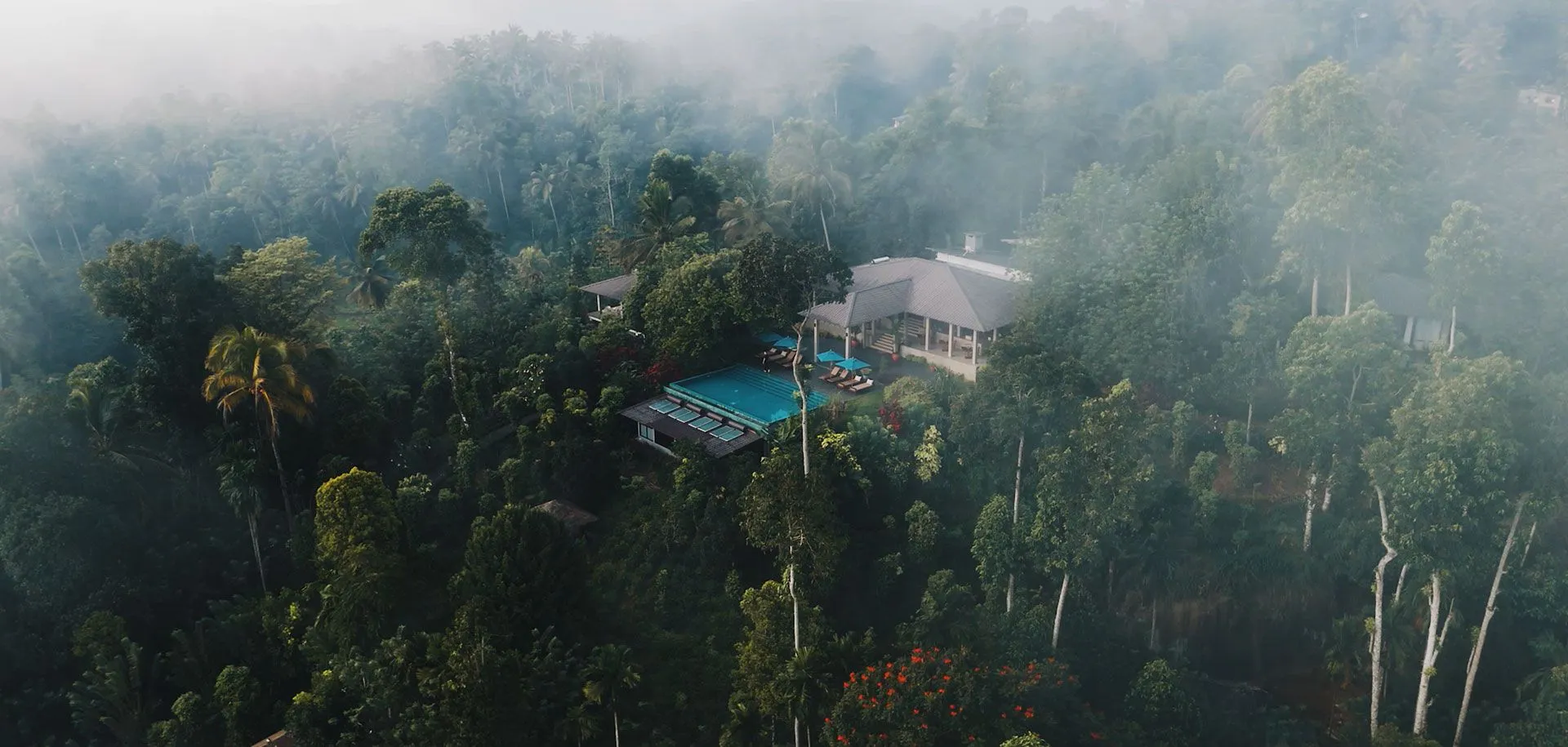 A private-pool villa terrace at Aarunya Nature Resort facing the forested slopes of the Knuckles Mountain Range near Kandy, Sri Lanka