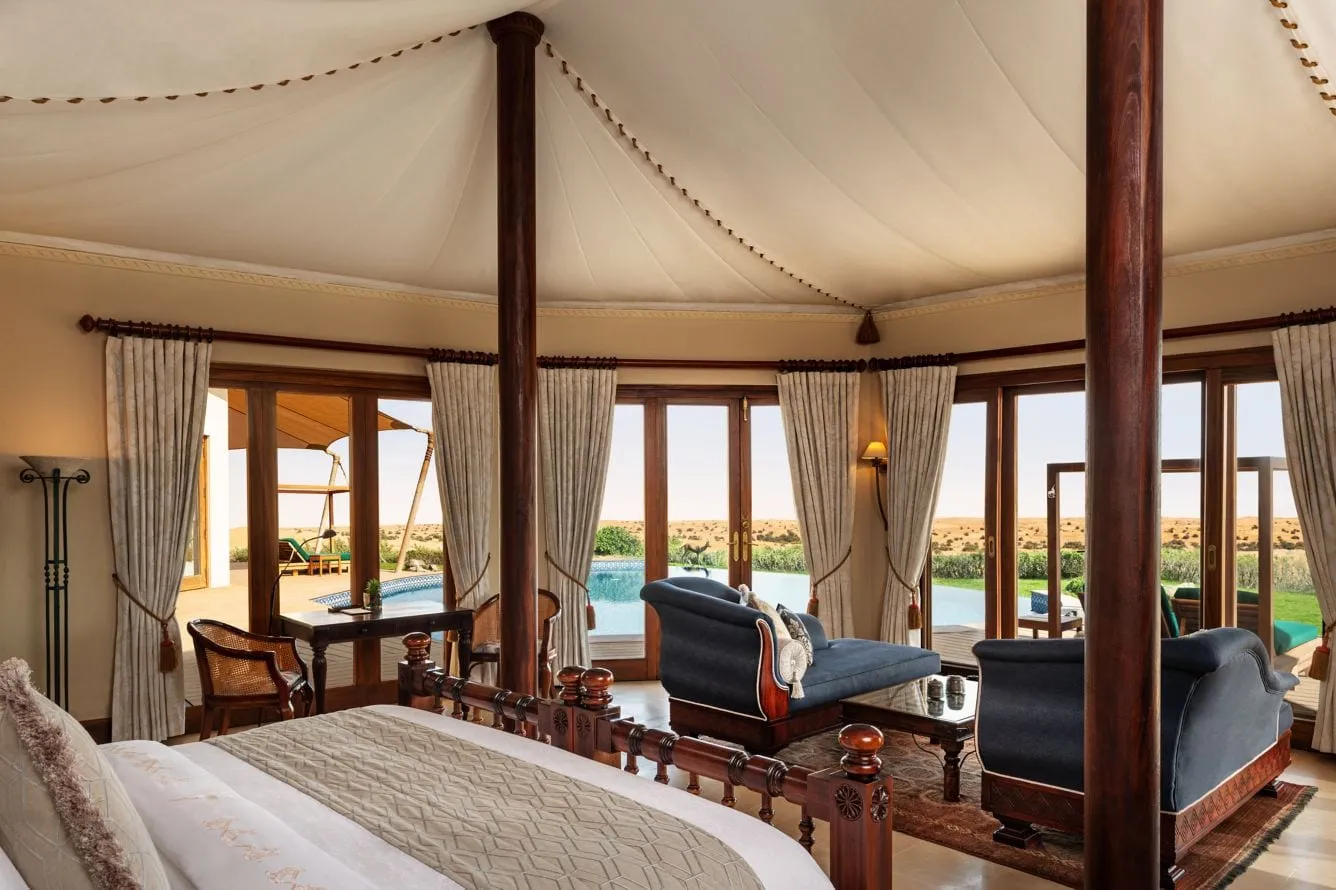 A private plunge pool on the deck of a suite at Al Maha overlooking the dunes