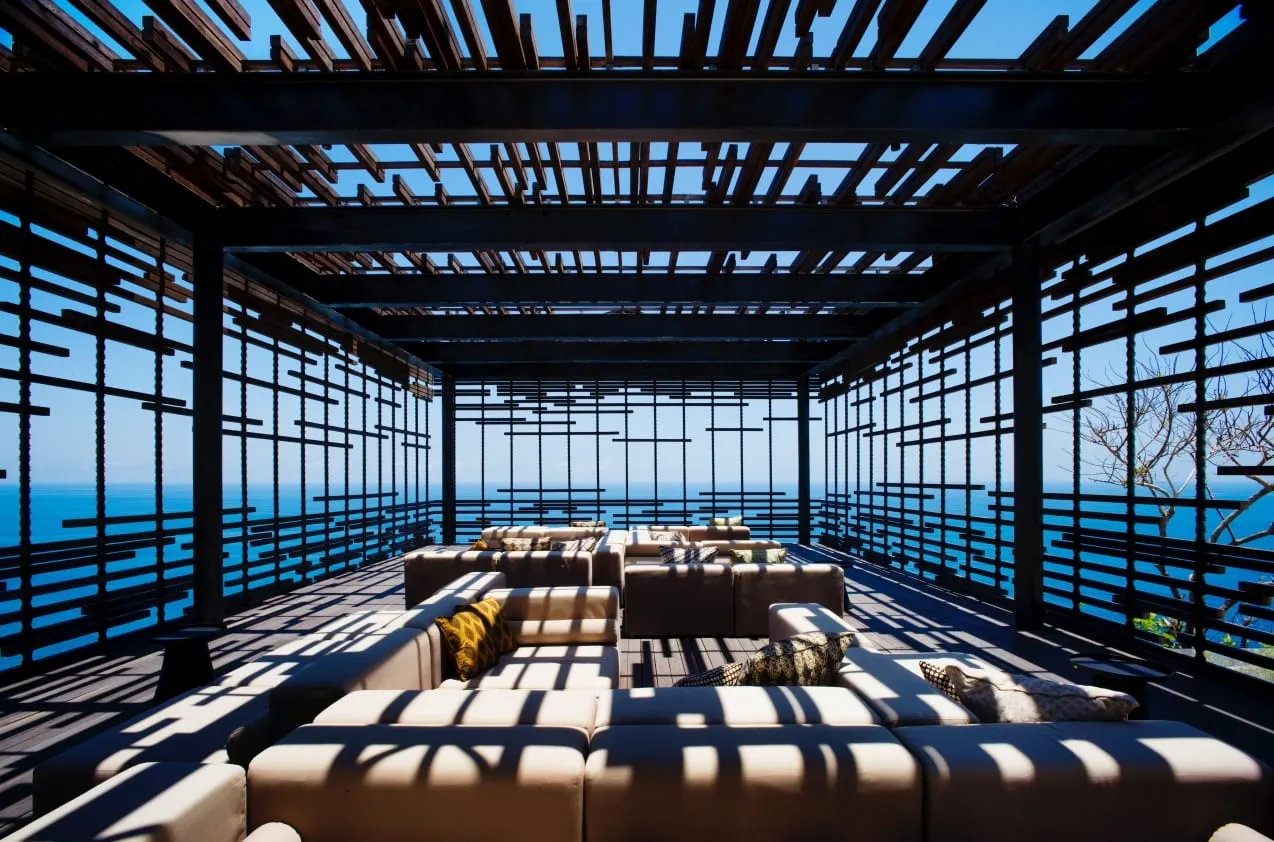 The cliff-edge yoga pavilion at Alila Villas Uluwatu cantilevered over the ocean
