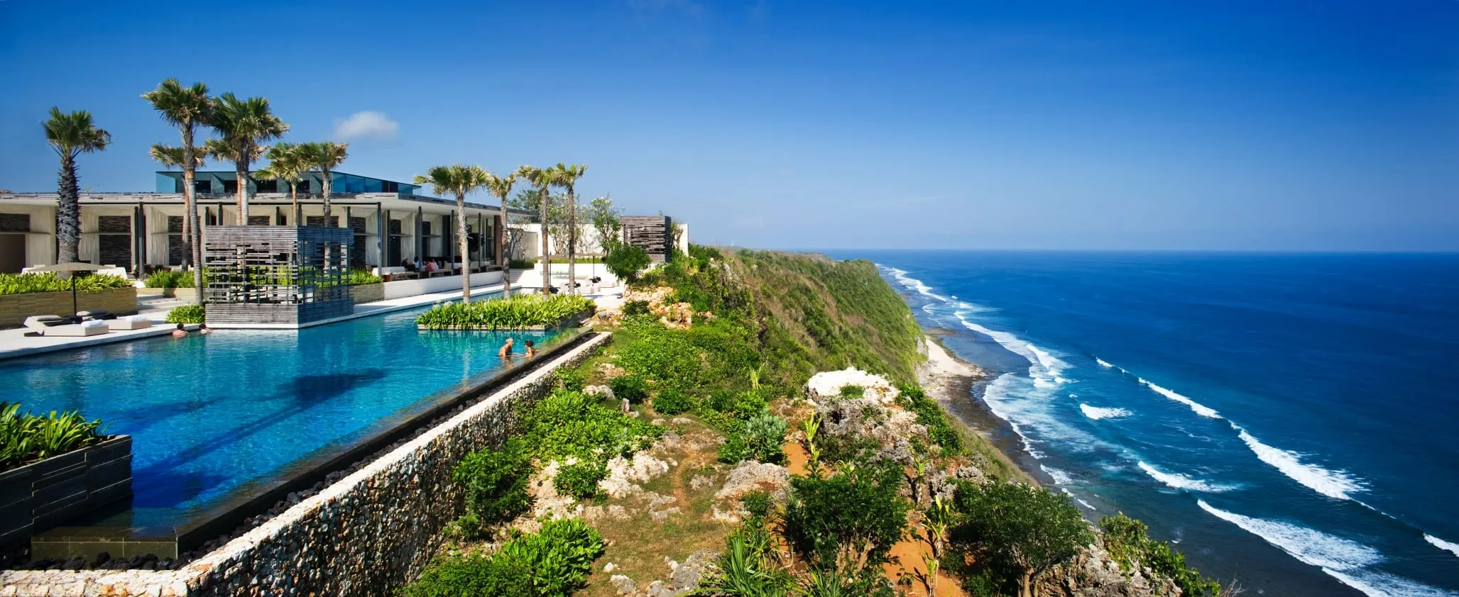 The geometric limestone architecture of Alila Villas Uluwatu cantilevered above the Indian Ocean on Bali's Bukit Peninsula