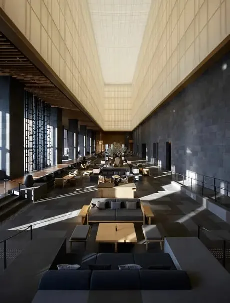 The six-storey washi paper lantern ceiling above Aman Tokyo's lobby lounge, lit from within over a zen garden and reflecting pool