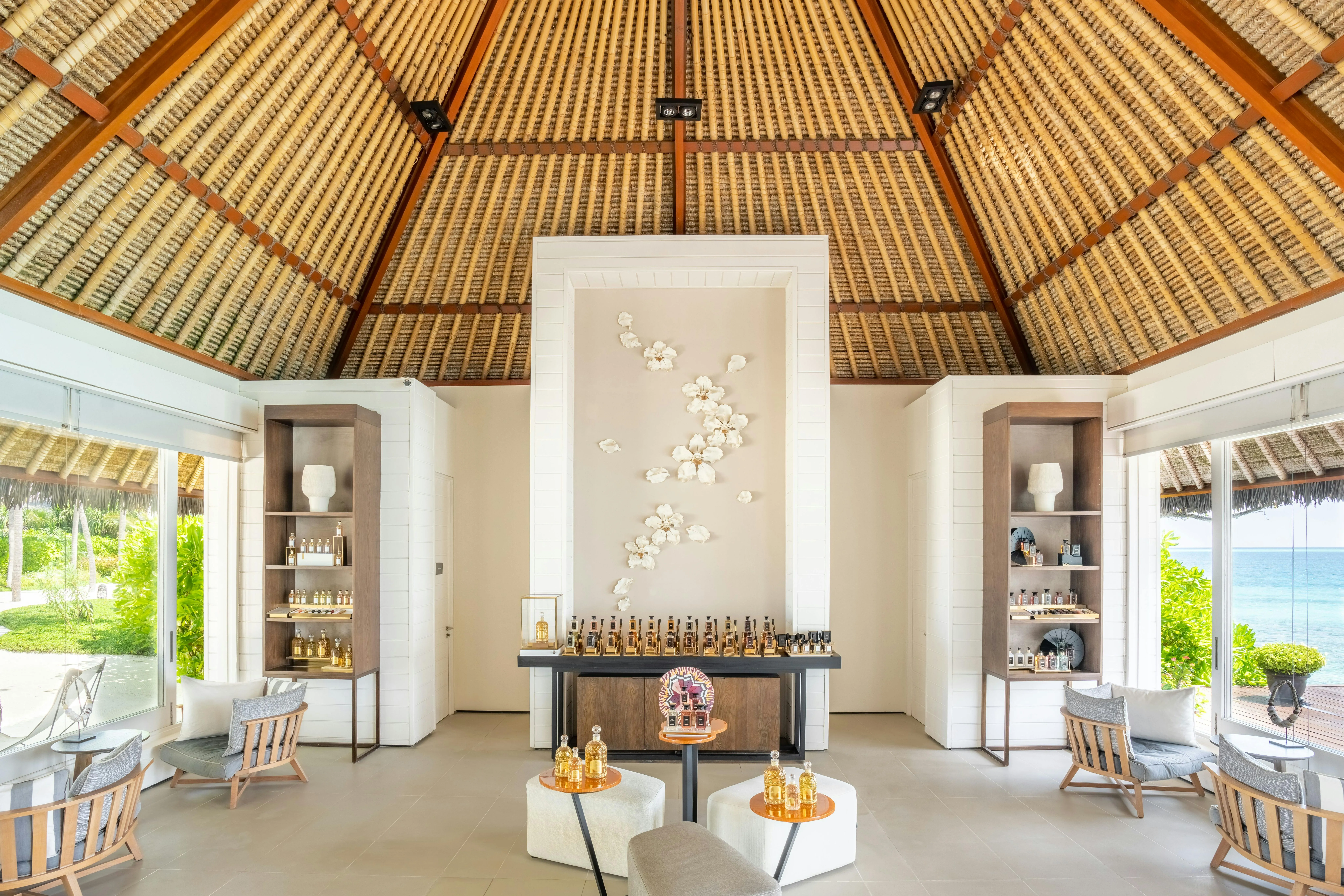 Le 1947 restaurant at Cheval Blanc Randheli, a small glass-walled dining room set among tropical gardens