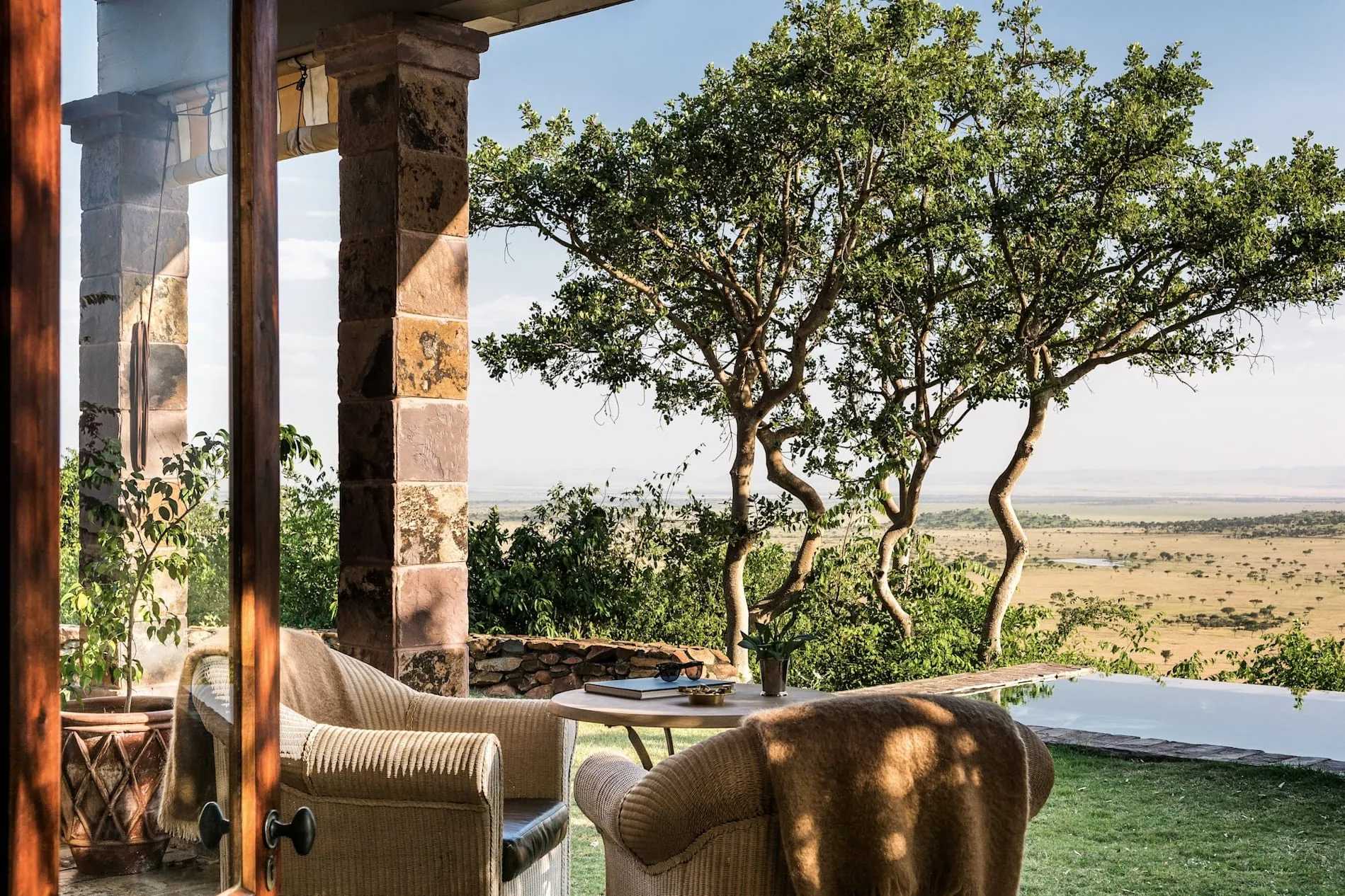 Singita Sasakwa Lodge's Edwardian manor house set on a hilltop overlooking the Grumeti Reserves and the Serengeti plains