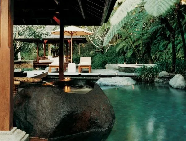 A sunrise yoga session on an open-sided pavilion overlooking the Ayung River valley
