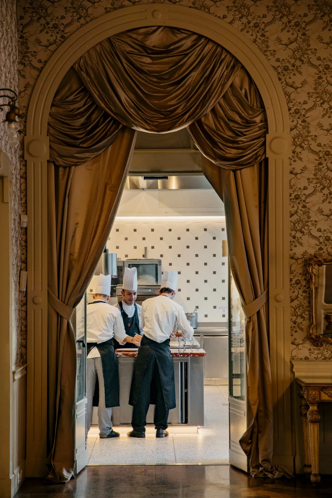 A Liberty-style guest suite at Grand Hotel Tremezzo with period furnishings and lake views