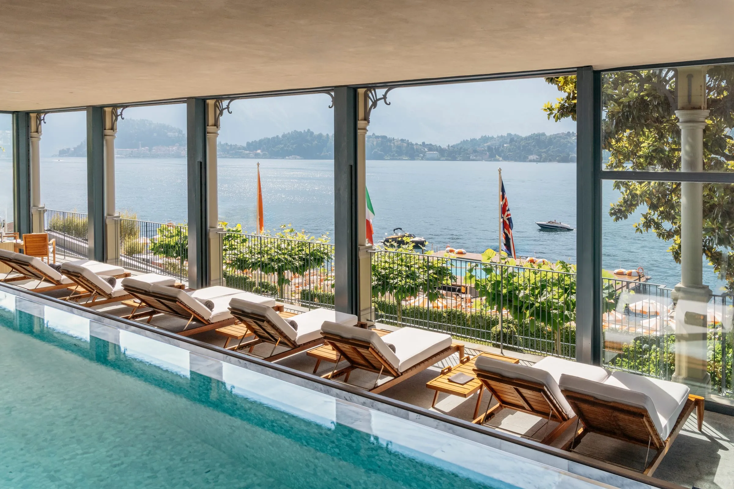 A terrace table set for dinner overlooking Lake Como at Grand Hotel Tremezzo