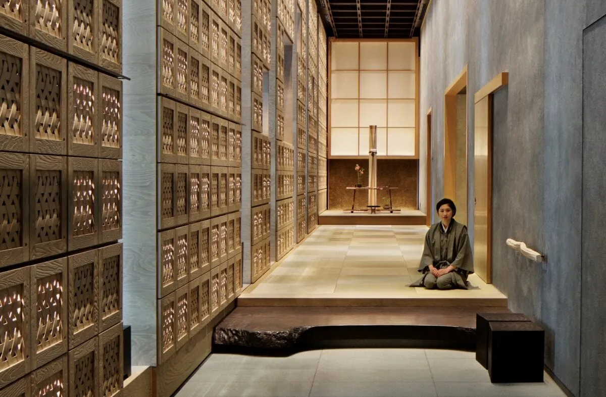 A tatami-floored guest room at Hoshinoya Tokyo with low furniture and shoji screens