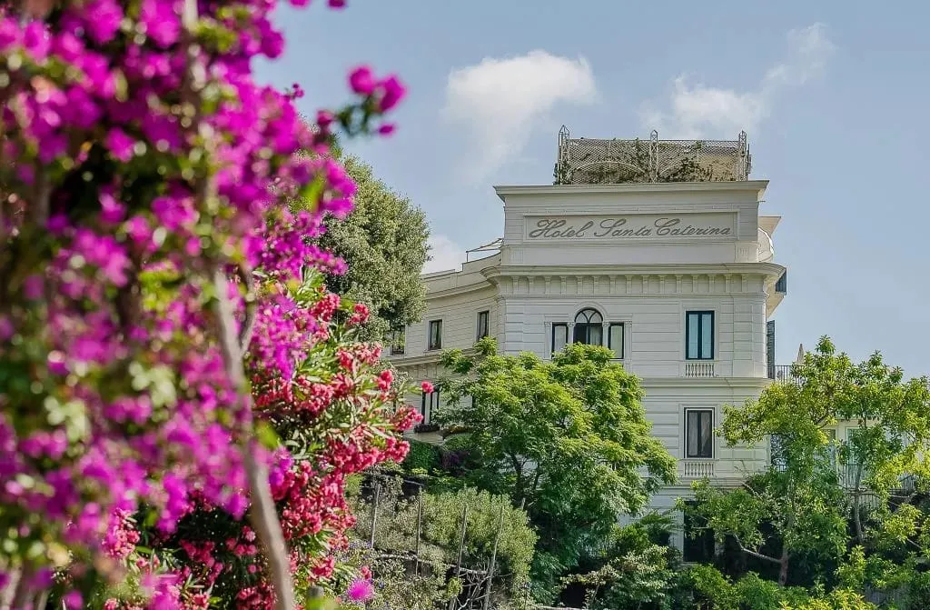 Hotel Santa Caterina's terraced cliffside facade above the Tyrrhenian Sea near Amalfi, Italy