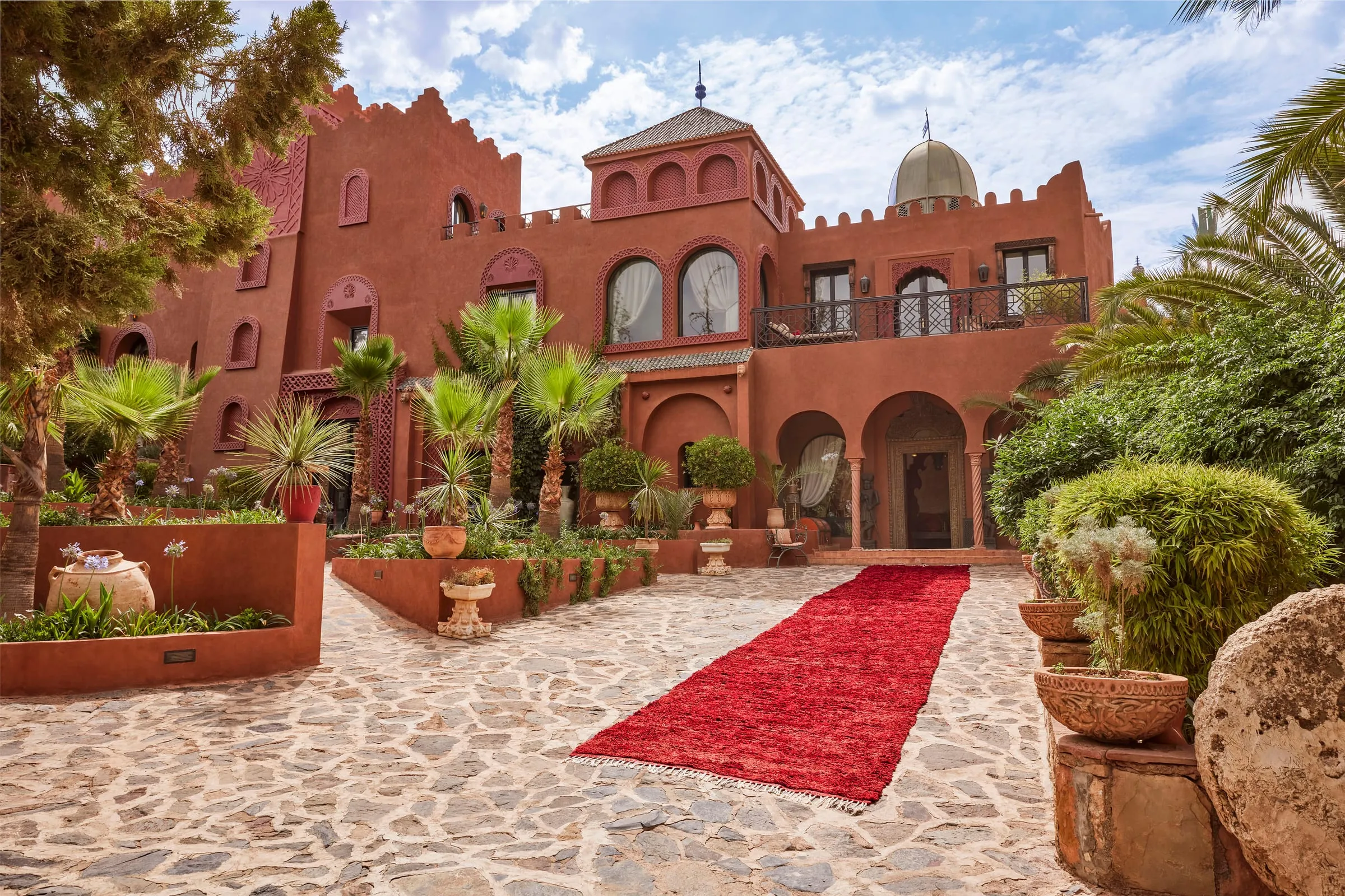 A luxury Berber tent with private terrace overlooking the Atlas Mountains