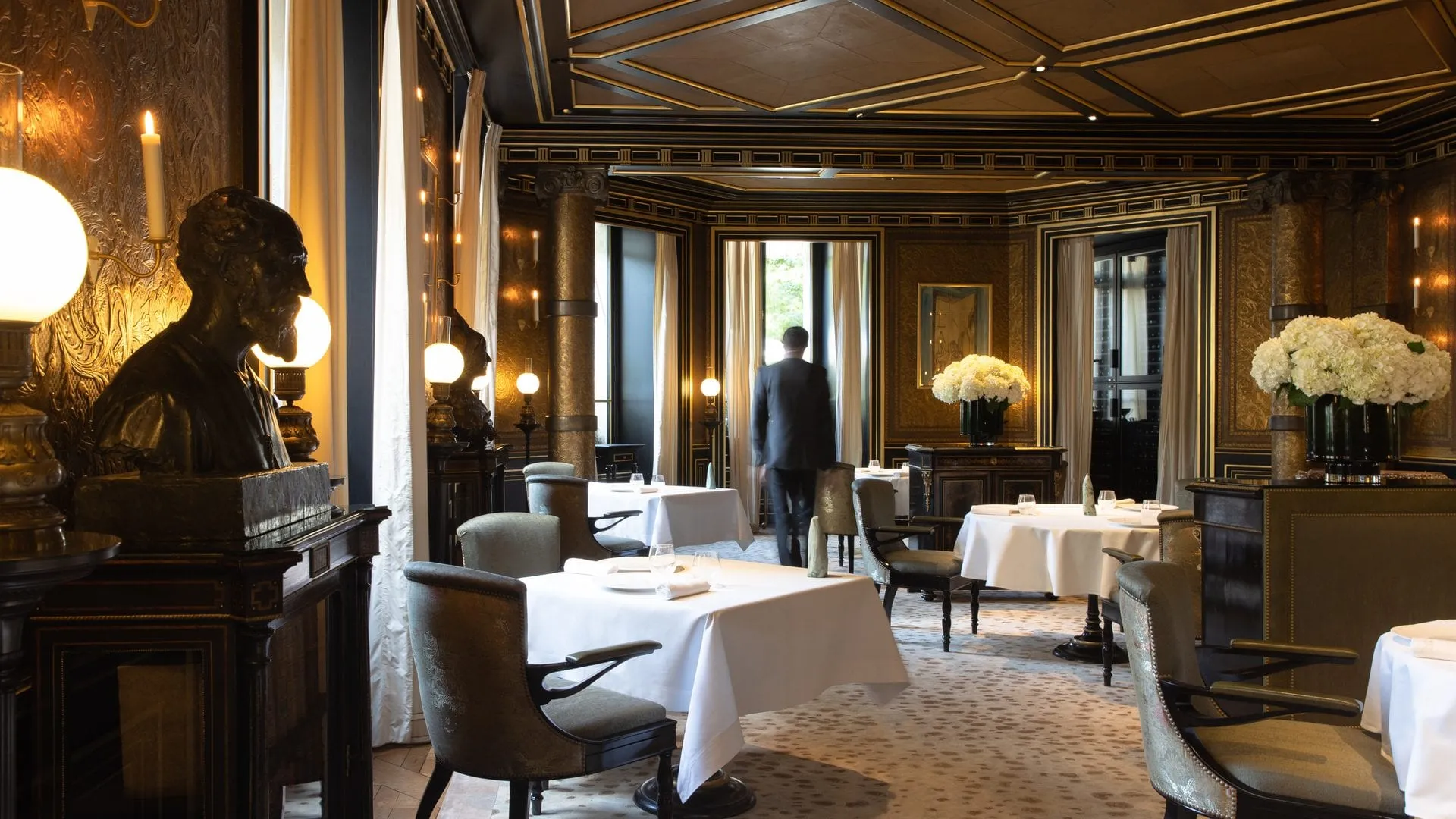 A table set in the dining room of Le Gabriel, the three-Michelin-starred restaurant inside La Reserve Paris