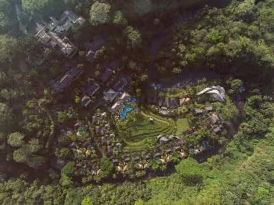 A private pool villa at Mandapa, A Ritz-Carlton Reserve, set among rice paddies above the Ayung River gorge in Ubud