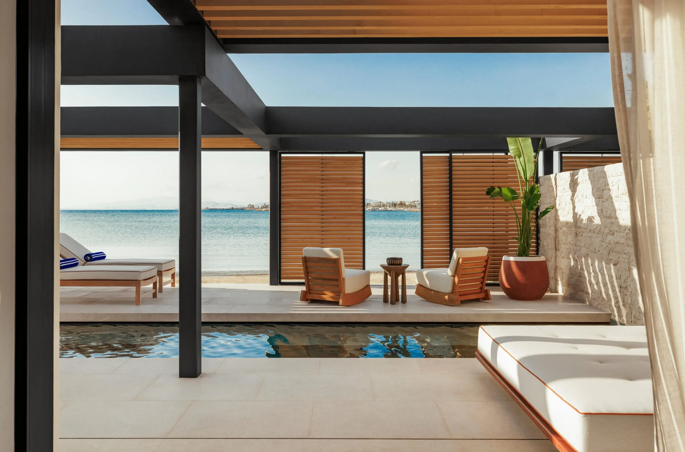 One&Only Aesthesis's midcentury-inspired bungalows and pine grounds on the Athens Riviera coastline
