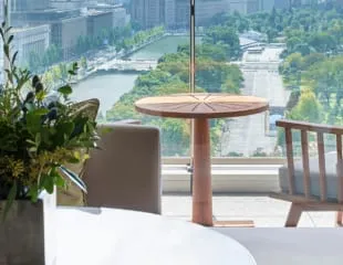 A guest room at Palace Hotel Tokyo with views toward the Imperial Palace gardens