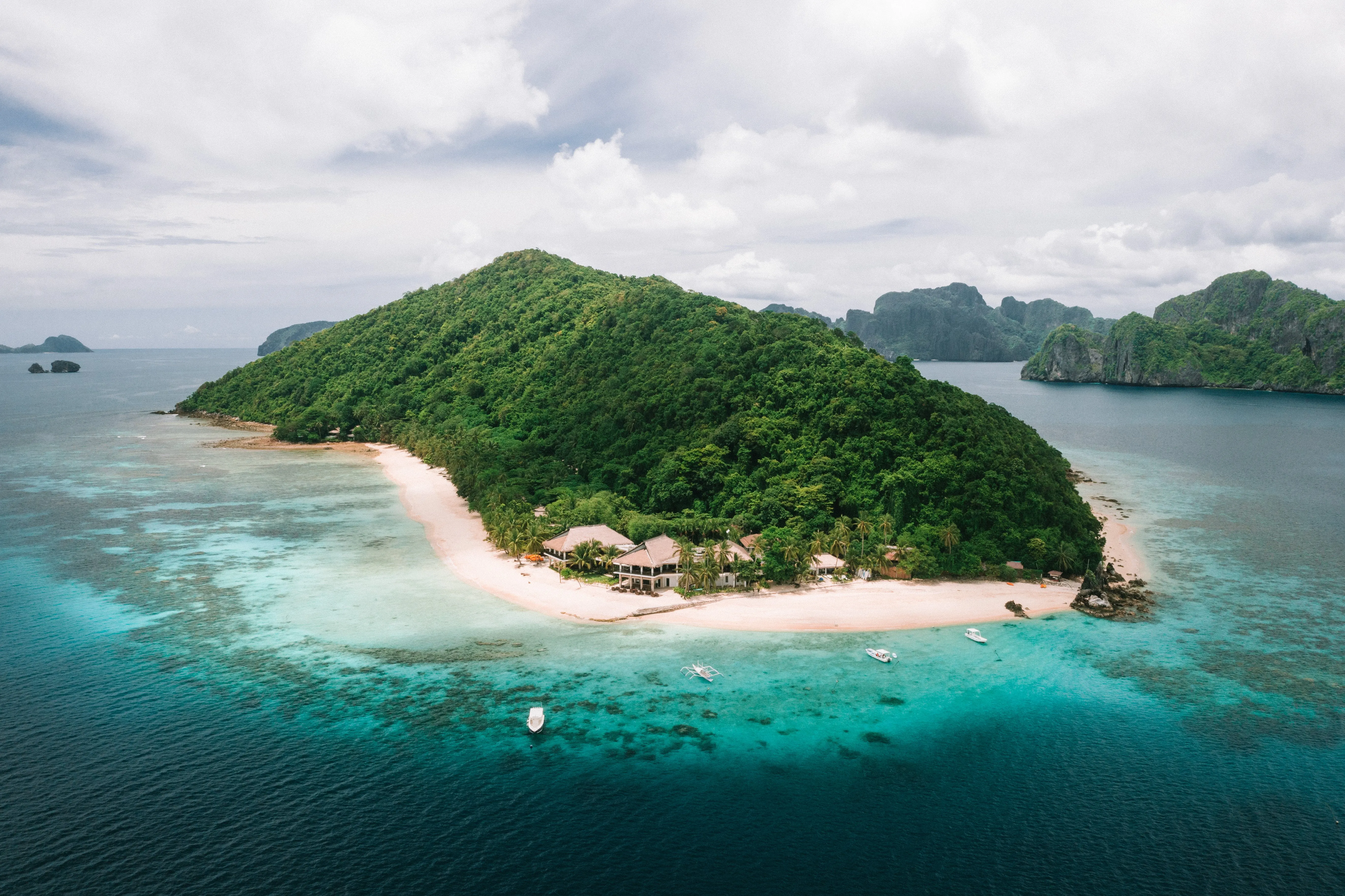 A private pool villa terrace at Pangulasian Island Resort with a plunge pool overlooking the sea