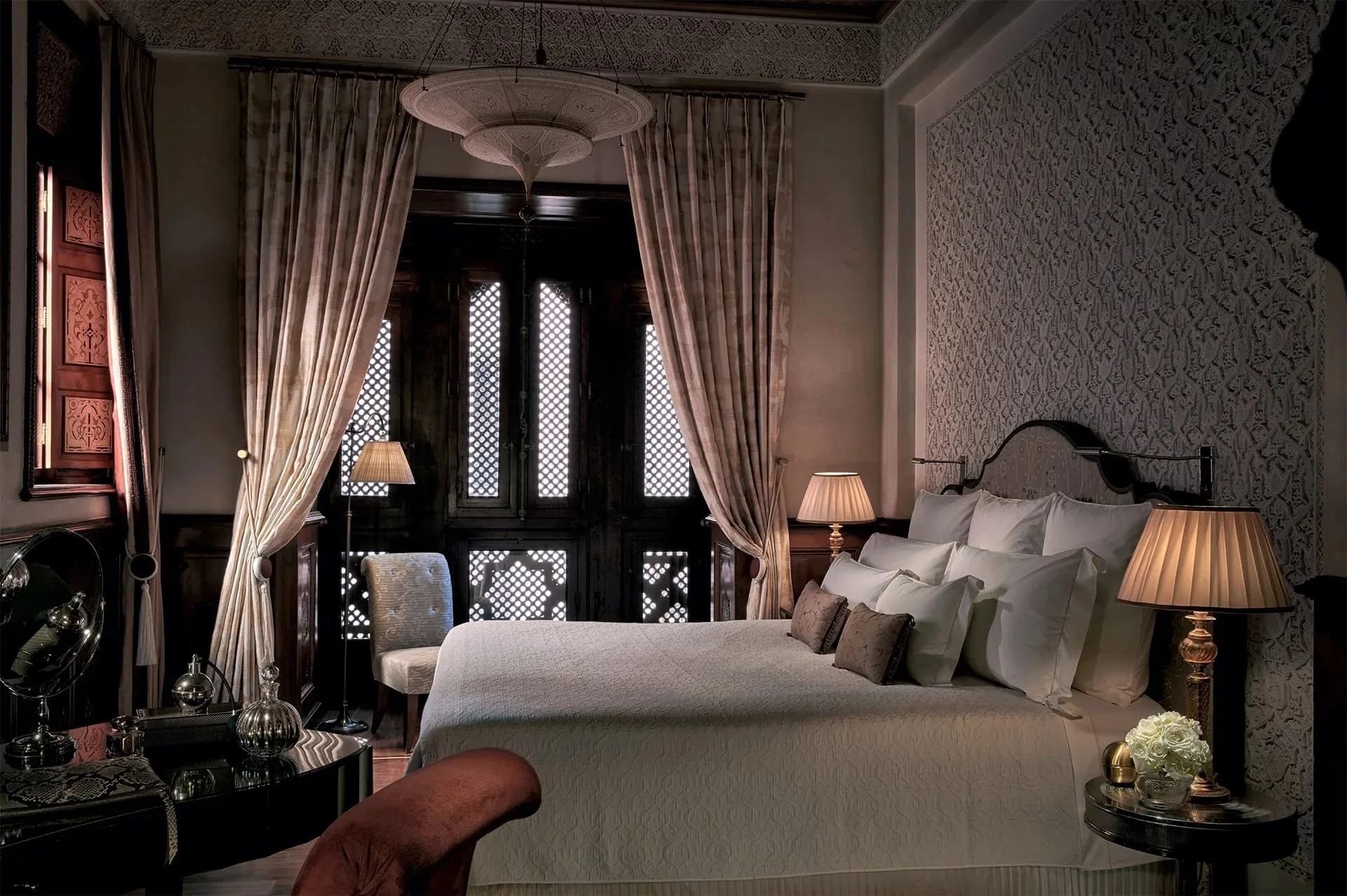 Zellige tilework and carved cedar detailing inside a Royal Mansour Marrakech riad