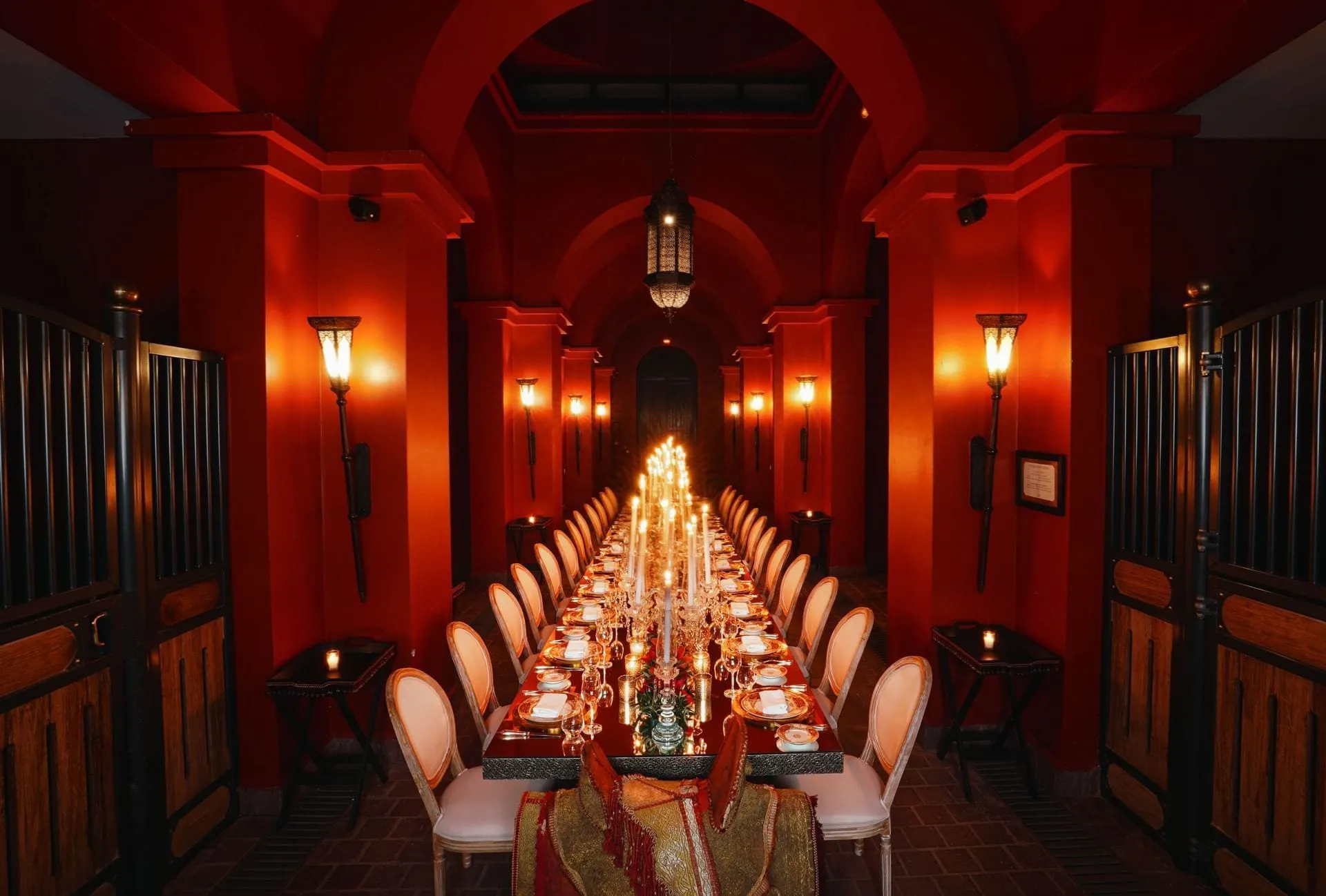 A guest suite at Selman Marrakech decorated in Jacques Garcia's dark-wood, Arab-Moorish style