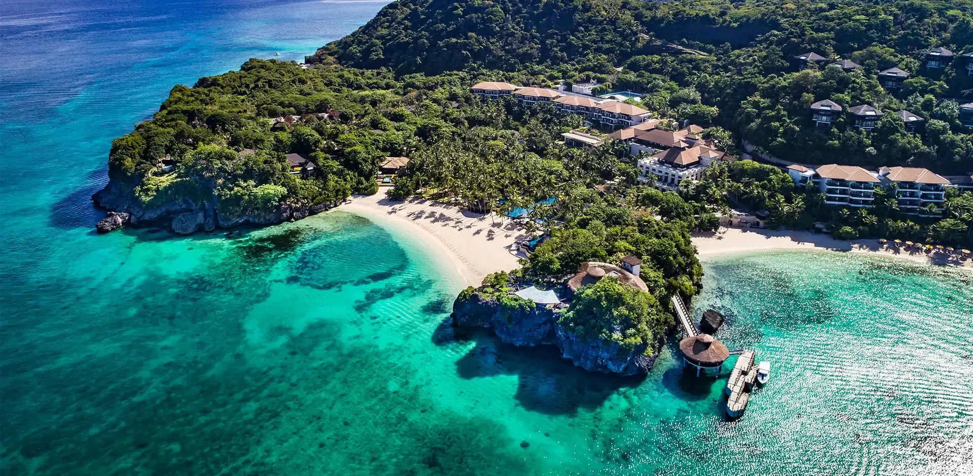 A treatment pavilion at CHI, The Spa at Shangri-La Boracay set on a rocky peninsula overlooking a private bay
