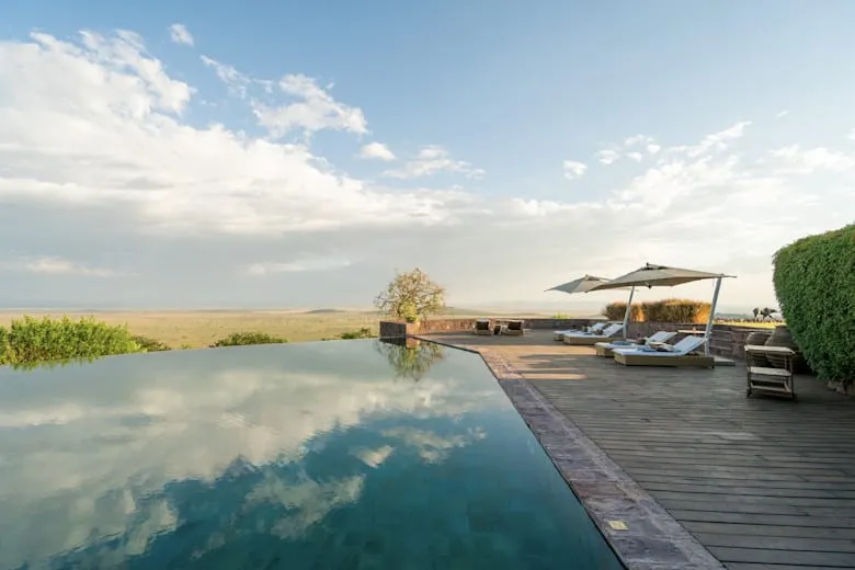 The wraparound veranda of Singita Sasakwa's main lodge overlooking the Serengeti
