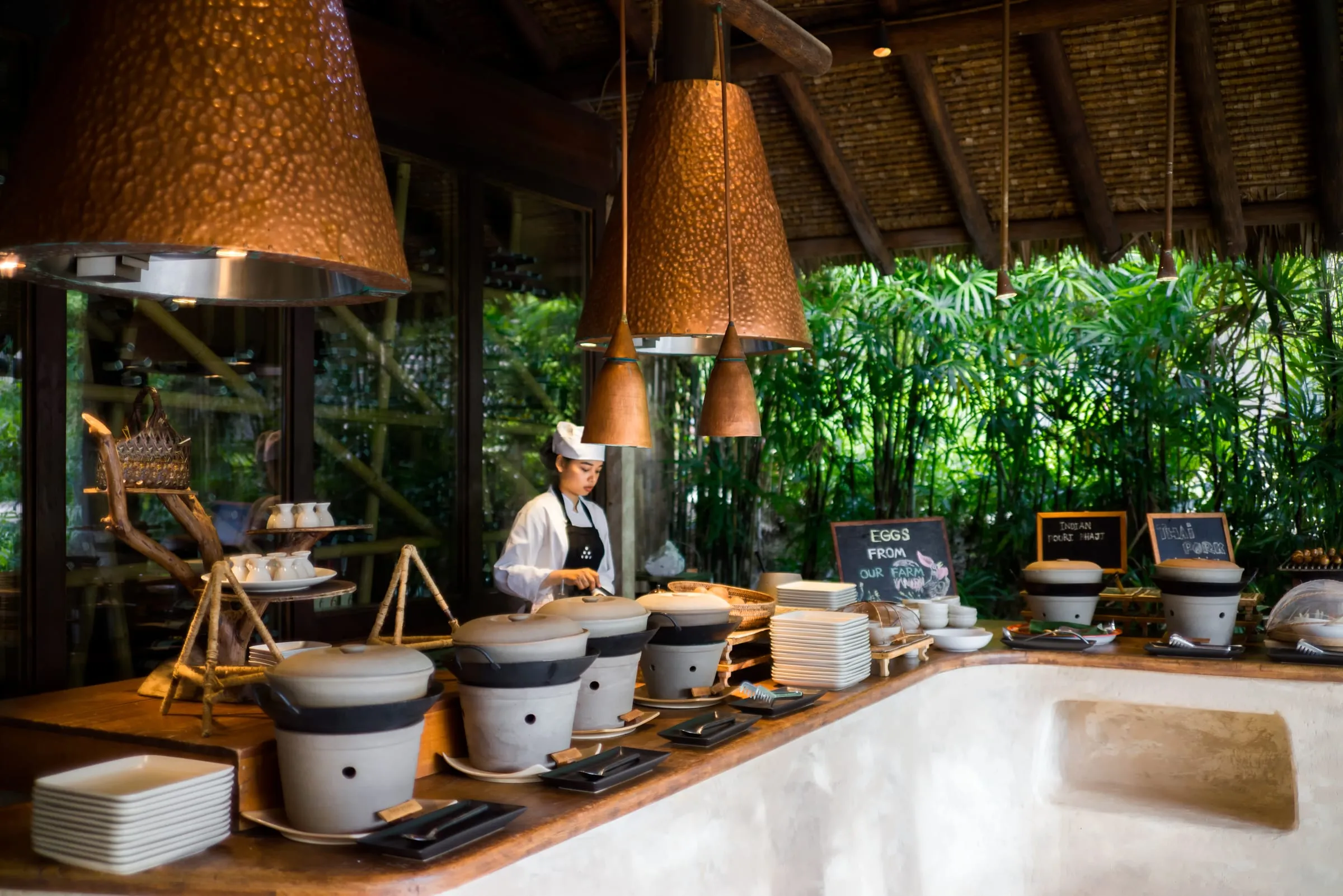 View across Phang Nga Bay's limestone pinnacles from The Hilltop bar at Six Senses Yao Noi