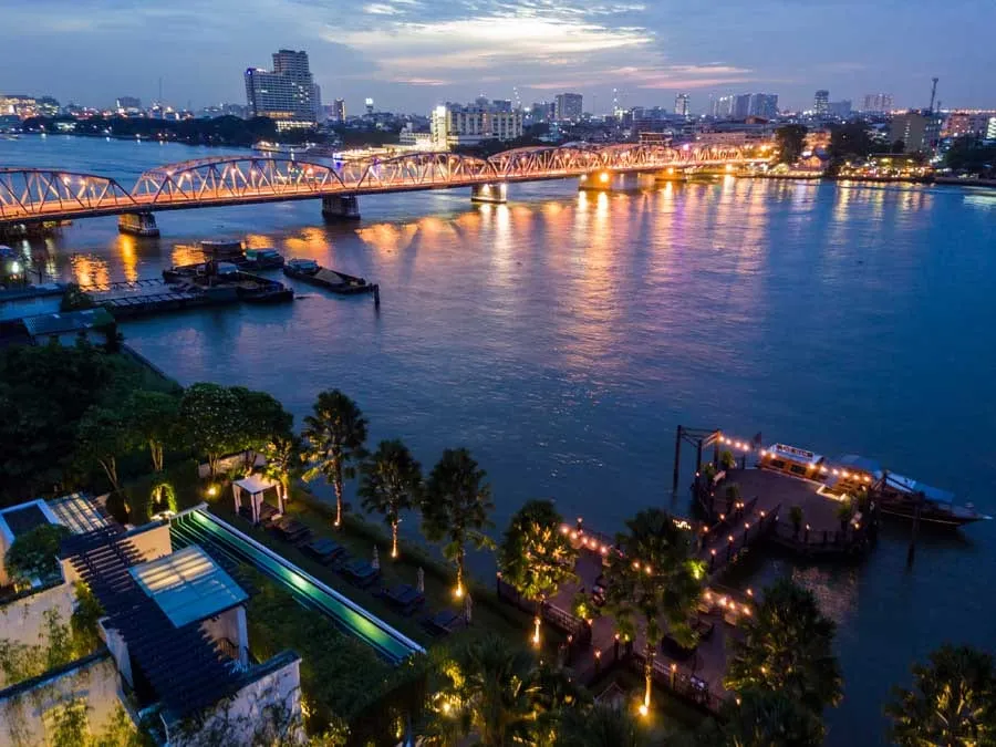 A vintage Thai teak house relocated to the grounds of The Siam hotel