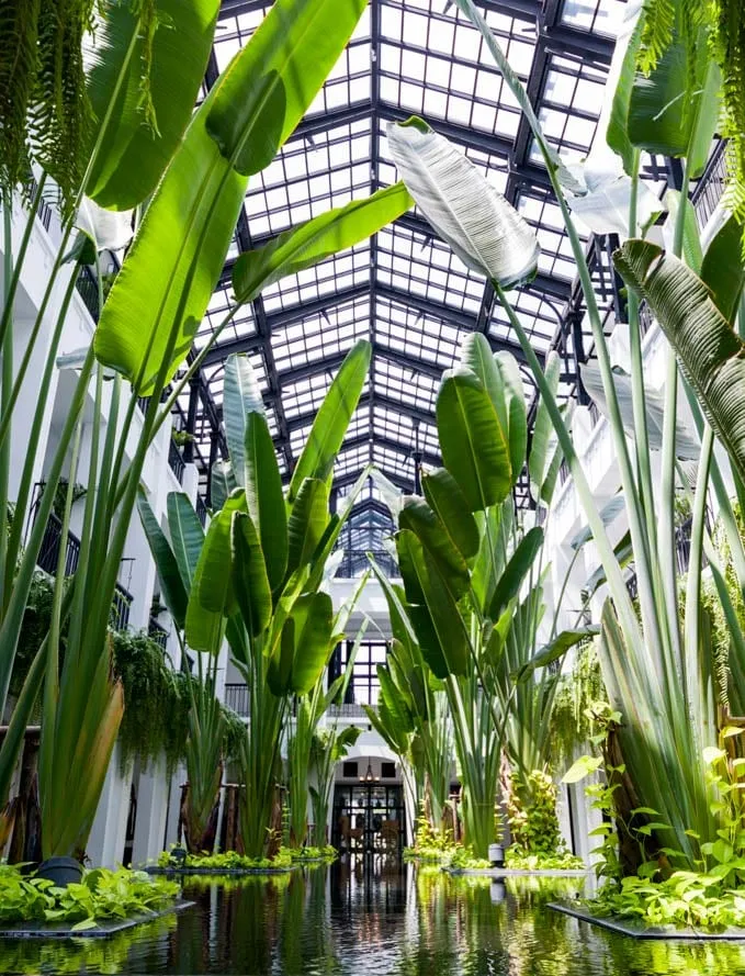 The Siam hotel's Art Deco-influenced riverside facade on the Chao Phraya River in Dusit, Bangkok