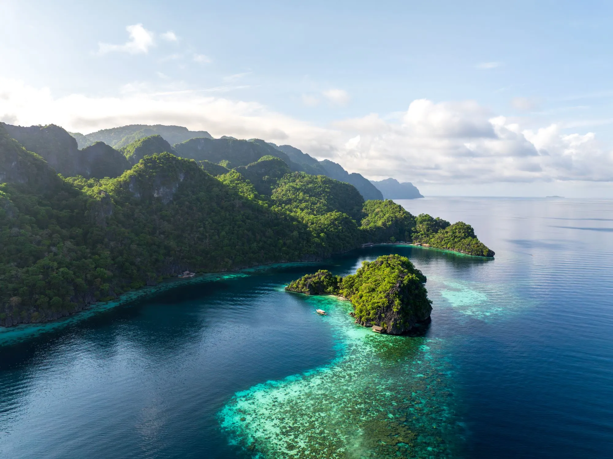 The limestone cliffs and turquoise water of Kayangan Lake near Coron, Palawan